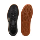 Zapatillas bajas de cuero negro con detalles en blanco y suela de goma marrón.
