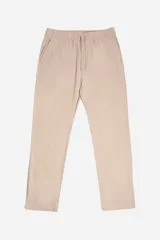 Pantalón de lino color beige, con cintura elastizada, logo bordado y fit regular.