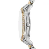Reloj Michael Kors modelo Sage, con caja de acero plateado y dorado de 31mm, bisel con cristales, esfera de nácar con números romanos dorados y agujas doradas.