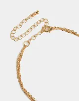 Collar doble dorado, con cadena de eslabones y cadena con perlas. Dije de corazón de piedra natural con aplique de estrella y perla colgante.