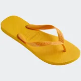 Ojotas Havaianas Top color blanco, con suela de goma y tiras con diseño de espiga.