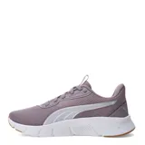 Championes Puma Flex Focus Lite Modern, color negro con detalles en dorado y suela blanca.