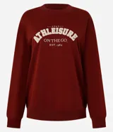 Buzo deportivo de algodón y poliéster color bordó, con cuello redondo, mangas largas y bordado "Athleisure" texturizado.