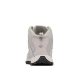 Bota de trekking de caña media Columbia Crestwood Mid Waterproof, color gris con detalles en rojo. Capellada de cuero, malla y cincha, con tecnología impermeable Omni-Tech.