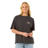 Remera negra de corte holgado con estampado pequeño del logo de Rip Curl y flores de hibisco en el pecho.