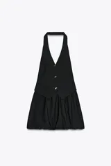 Minivestido negro con forma de chaleco, cuello halter, escote en pico, botones metálicos y bajo globo.
