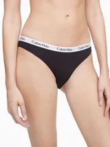 Conjunto de ropa interior Calvin Klein, compuesto por un corpiño deportivo negro con elástico con logo y una bombacha clásica negra con elástico con logo.
