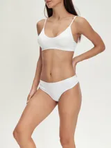 Pack de tres colaless de algodón en color gris con cintura elástica blanca.