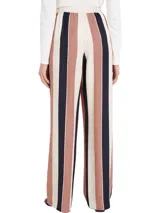 Pantalón de viscosa con estampado de rayas verticales en azul marino, rojo y blanco. Tiene cintura elástica y corte amplio.