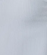 Conjunto de pijama compuesto por musculosa de rib color celeste con breteles finos y encaje en el escote, y short blanco con estampado de amuletos.