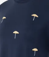 Blusa slim de mangas cortas, confeccionada en viscolycra, con cuello redondo y bordados de paraguas.