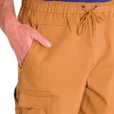 Pantalón cargo color arena de corte slim, con bolsillos laterales con solapa y puños elásticos.