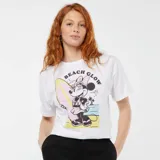 Camiseta blanca de manga corta con cuello redondo y estampado de Minnie Mouse con gafas de sol y tabla de surf, con el texto "Beach Glow".