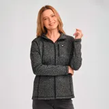 Campera polar de mujer marca CAT, color gris jaspeado, con cierre frontal, cuello alto y bolsillos laterales con cierre.