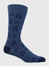 Medias de vestir para hombre, color azul oscuro, con diseño jacquard que incluye el logo de Hush Puppies (cabeza de perro basset hound), la palabra "Hush Puppies" y el texto "Since 1958" repetidos. El talón y la punta son de color azul más oscuro.