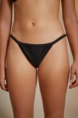 Bombacha vedetina color marfil con textura acanalada.