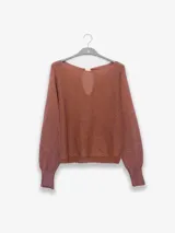 Sweater tejido en jersey con lurex, escote bote y detalle de tigre insignia de Polonio en la espalda.