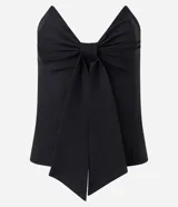 Blusa sin breteles negra confeccionada en bengalina, con escote triangular y lazo aplicado.