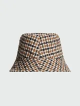 Sombrero tipo bucket reversible con estampado a cuadros en tonos marrón, beige y negro.