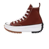Zapatillas de lona de mujer con plataforma voluminosa y suela de goma dentada, color marrón, con puntera de goma y patch de Chuck Taylor.
