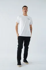 Pantalón de jogging negro de felpa con logo estampado y en goma, bolsillos con cierre, cierres en los tobillos, cintura ajustable y puños.