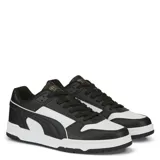 Championes Puma RBD Game Low de cuero sintético negro con detalles en blanco y suela de goma.