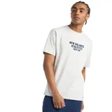 Remera gris jaspeado de algodón, con cuello redondo y mangas cortas. Estampado frontal con el texto "New Balance Athletics Since 1906" en azul marino.