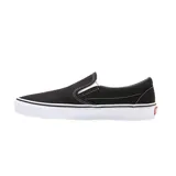 Zapatillas Vans Classic Slip-On negras con suela blanca de goma y logo de la marca en el lateral.