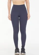 Calza deportiva larga azul con bolsillos laterales y corte ajustado.