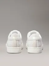 Zapatillas urbanas Calvin Klein Jeans color blanco, de cuero liso con apliques de gamuza en la puntera y logo CK en el lateral.