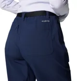 Pantalón de senderismo Columbia Brea Falls Nylon para mujer, color azul marino. Confeccionado en tejido repelente al agua y resistente a las manchas, con protección solar UPF 50. Cuenta con cintura elástica parcial, cinturón integrado y extraíble, bolsillos con cierre y puños ajustables con cordón.