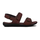 Sandalias marrones con ajuste de velcro en dos tiras y pulsera trasera.