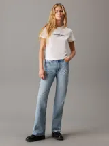 Remera blanca de algodón con logo "Calvin Klein Jeans Established 1978" estampado en el pecho.