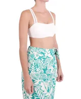 Falda midi de tiro alto con estampado floral en tonos turquesa y blanco, con lazo lateral.