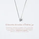 Conjunto de plata 925 con dije de circonia redonda engarzada. Incluye cadena de 45cm con alargue de 5cm y dije de 0,8cm de diámetro.