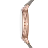 Reloj Skagen Signatur Lille para mujer con caja redonda de acero inoxidable color oro rosa, esfera gris con agujas e indicadores minimalistas y correa de cuero gris.