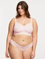 Panty corte brazilian color rosa claro, de microtul y encaje.