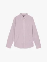 Camisa Tommy Hilfiger de corte regular, confeccionada en popelina de algodón a rayas verticales rojas, azules y blancas. Cuenta con cuello abotonado, mangas largas con puños abotonados, logo bordado en el pecho y tecnología Flex para mayor comodidad.