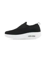 Zapatilla negra de flyknit con suela blanca y burbuja de aire.