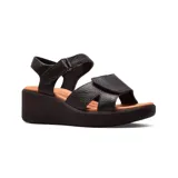 Sandalias de cuero color beige, con plataforma y ajuste con velcro.