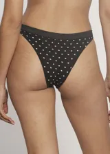 Pack de tres bombachas vedetinas de microfibra sin costuras, con fundillo de algodón. Incluye una bombacha verde con lunares blancos, una bombacha bordó con lunares blancos y una bombacha negra con lunares blancos.