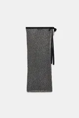 Pareo de punto gris con cintura combinada a contraste en negro y lazo lateral.