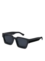 Lentes de sol rectangulares negros con montura gruesa de policarbonato reciclado y protección UV.