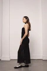 Vestido largo negro de gasa con lurex y punto smock.