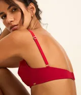 Soutien blanco de encaje con aro, breteles ajustables y cierre en la espalda.