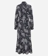 Vestido largo tipo chemise confeccionado en viscolino con estampado floral. Tiene cuello de camisa, mangas largas, abotonadura frontal y lazo en la cintura.