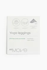 Calza de yoga negra de tiro alto, confeccionada en tejido funcional SoftMove™ con tecnología Lycra® Sport y DryMove™.