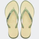 Ojotas Havaianas Top Point Fusion color beige con tiras verdes con textura.