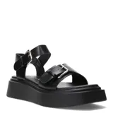 Sandalias negras con plataforma, tiras anchas y hebillas plateadas.