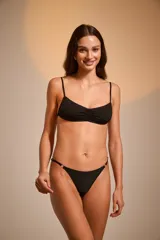 Colaless de lycra estampada en tonos rosa y verde con diseño abstracto.